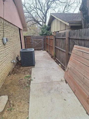 a view of a patio with a yard