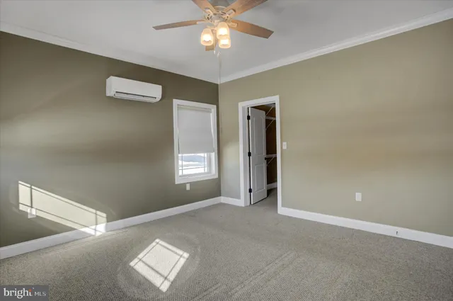 a view of a room with racks on the wall