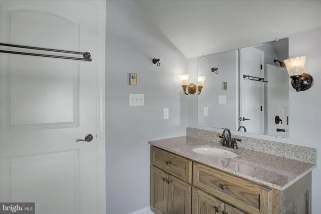 a view of a livingroom with furniture and hardwood floor