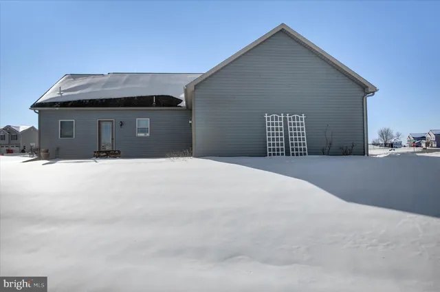 a view of a water heater and a chair