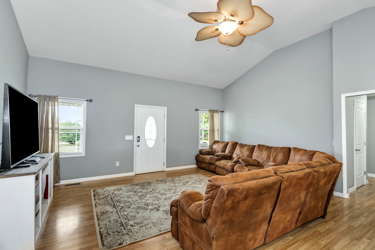 61 Slaughter Pen Road Ardmore, TN 38449 - Photo 6 of 23 a living room with furniture and a flat screen tv
