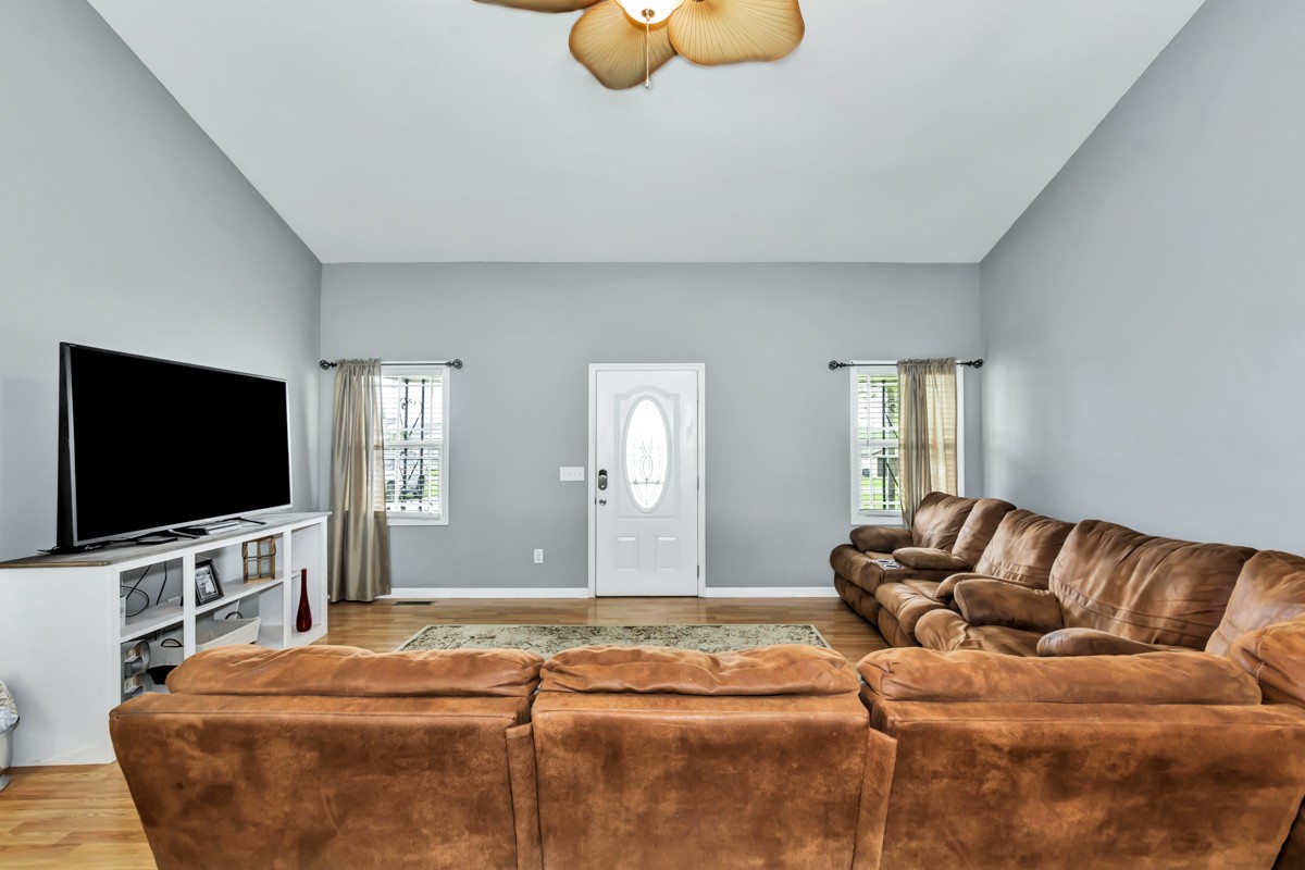 61 Slaughter Pen Road Ardmore, TN 38449 - Photo 7 of 23 a living room with furniture and a flat screen tv