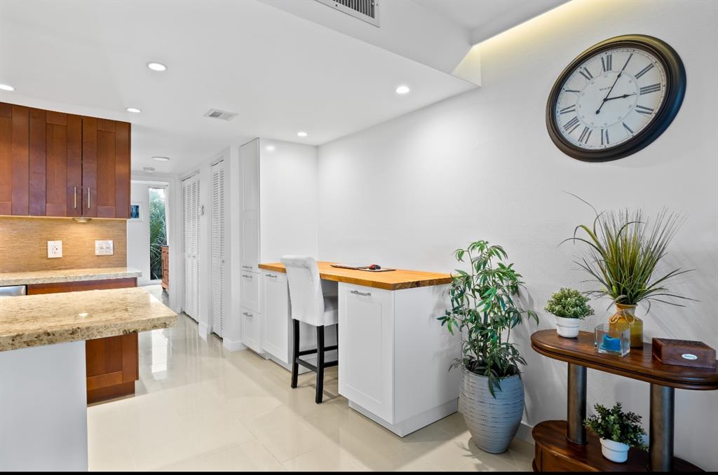 1901 North Andrews Avenue, Unit 222 Wilton Manors, FL 33311 - Photo 13 of 23 a view of a hallway with entryway