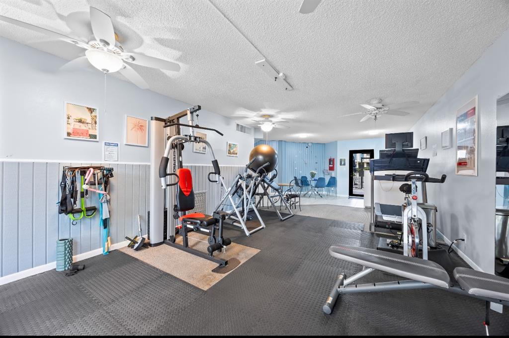 1901 North Andrews Avenue, Unit 222 Wilton Manors, FL 33311 - Photo 18 of 23 a view of a room with gym equipment