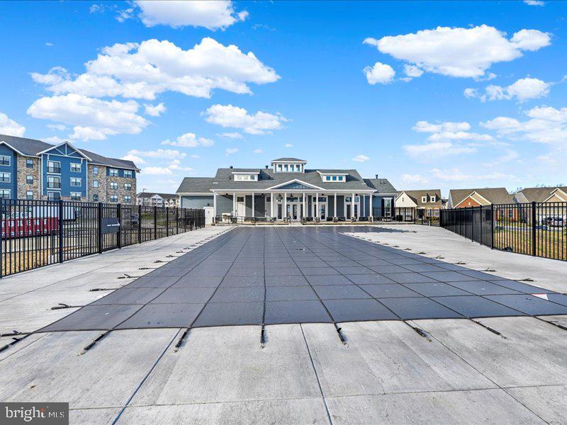 4003 Seaside Alder Road, Unit 308 ROSE Bowie, MD 20720 - Photo 40 of 44 a terrace with a city view