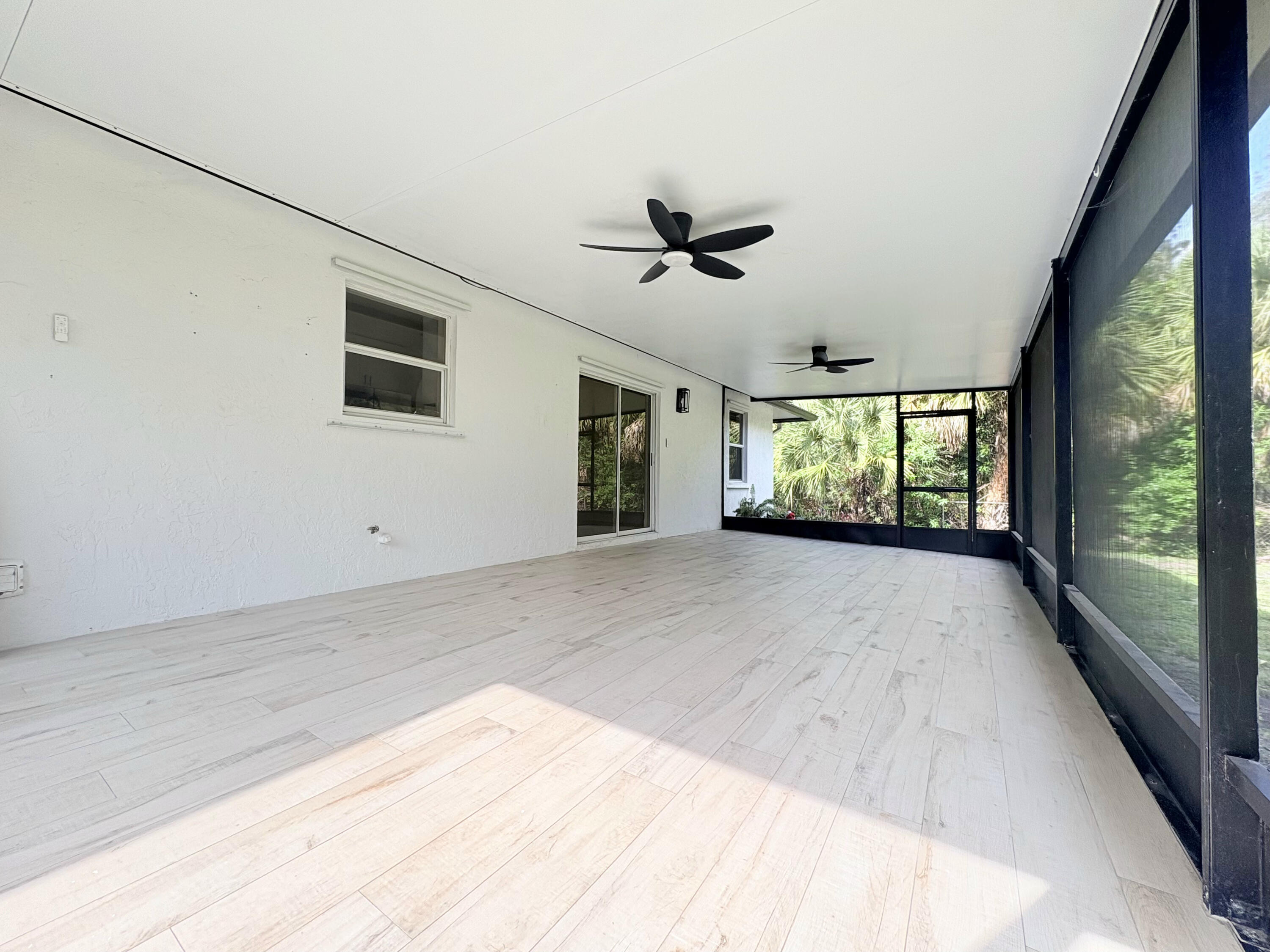 14523 Flamingo Road Loxahatchee Groves, FL 33470 - Photo 42 of 50 a view of an empty room with a window
