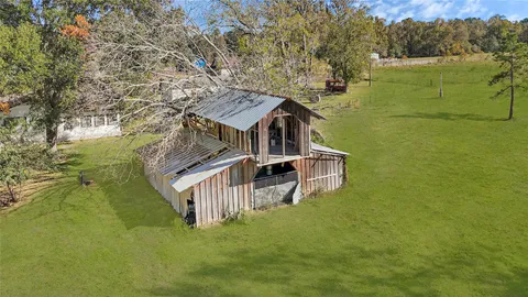 a view of a house with a ocean view