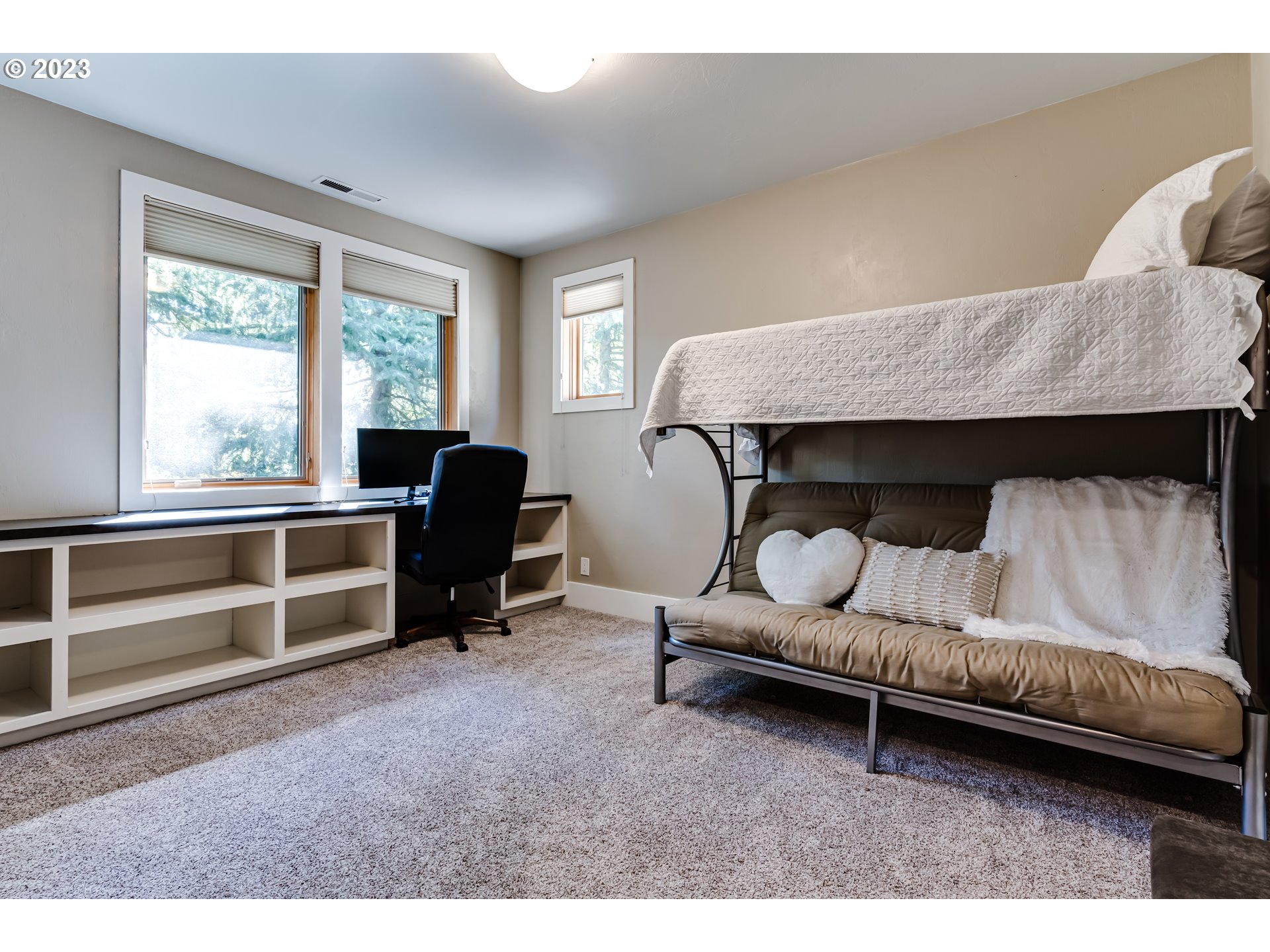 3321 Michael Lane Eugene, OR 97405 - Photo 32 of 46 a bedroom with a bed and a chair