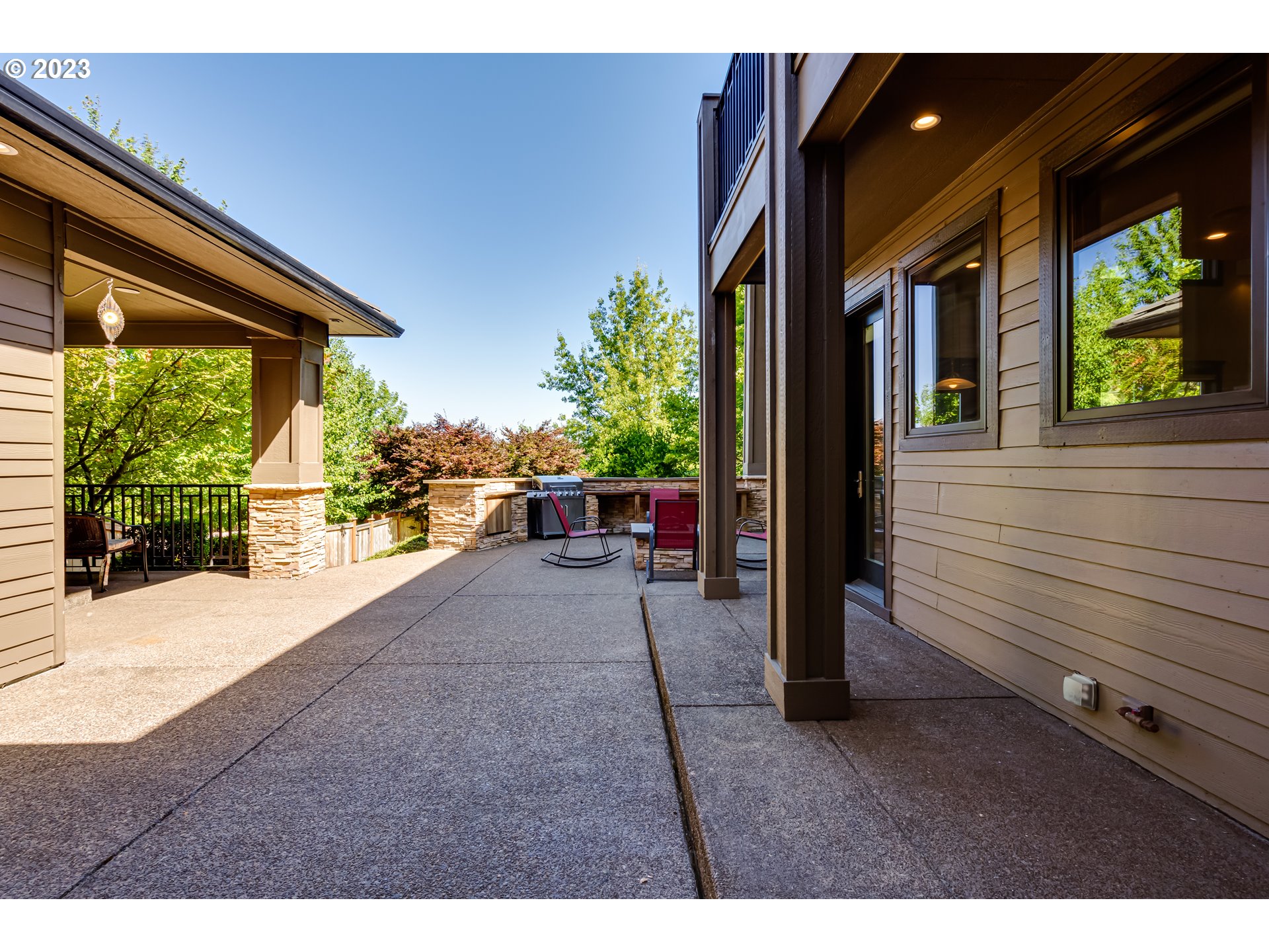 3321 Michael Lane Eugene, OR 97405 - Photo 34 of 46 a view of a porch with furniture and floor to ceiling window