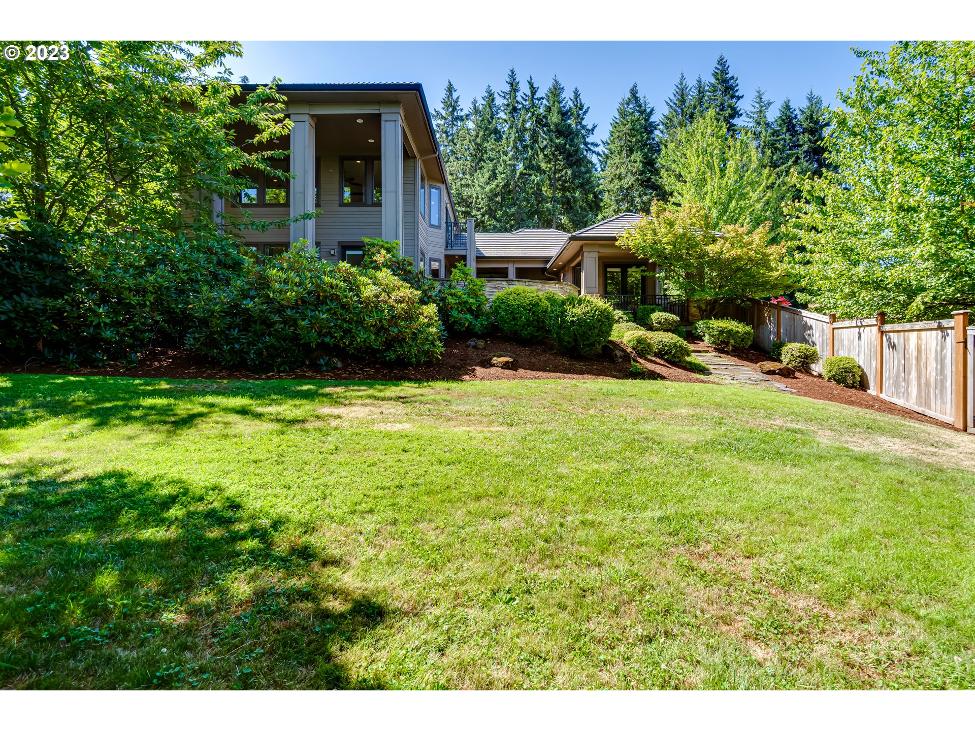 3321 Michael Lane Eugene, OR 97405 - Photo 39 of 46 a view of a house with a yard and sitting area