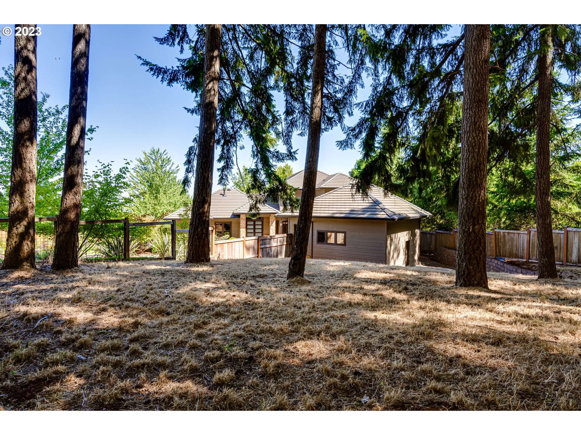3321 Michael Lane Eugene, OR 97405 - Photo 41 of 46 a house with trees in front of it