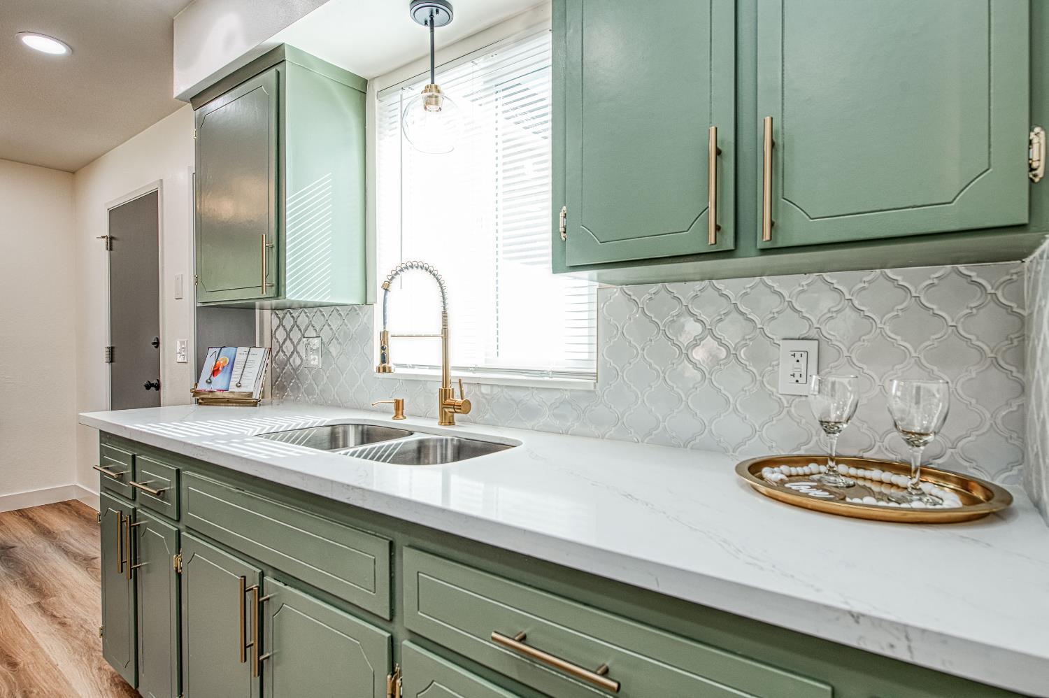 1747 Gettysburg Avenue Clovis, CA 93611 - Photo 3 of 39 a bathroom with a sink and a mirror