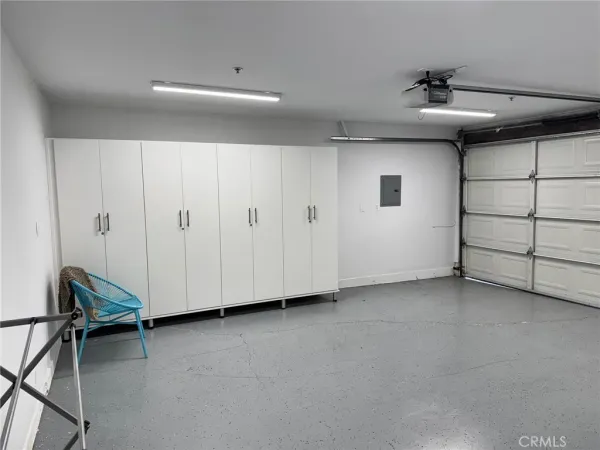 a kitchen with stainless steel appliances granite countertop a sink and a cabinets