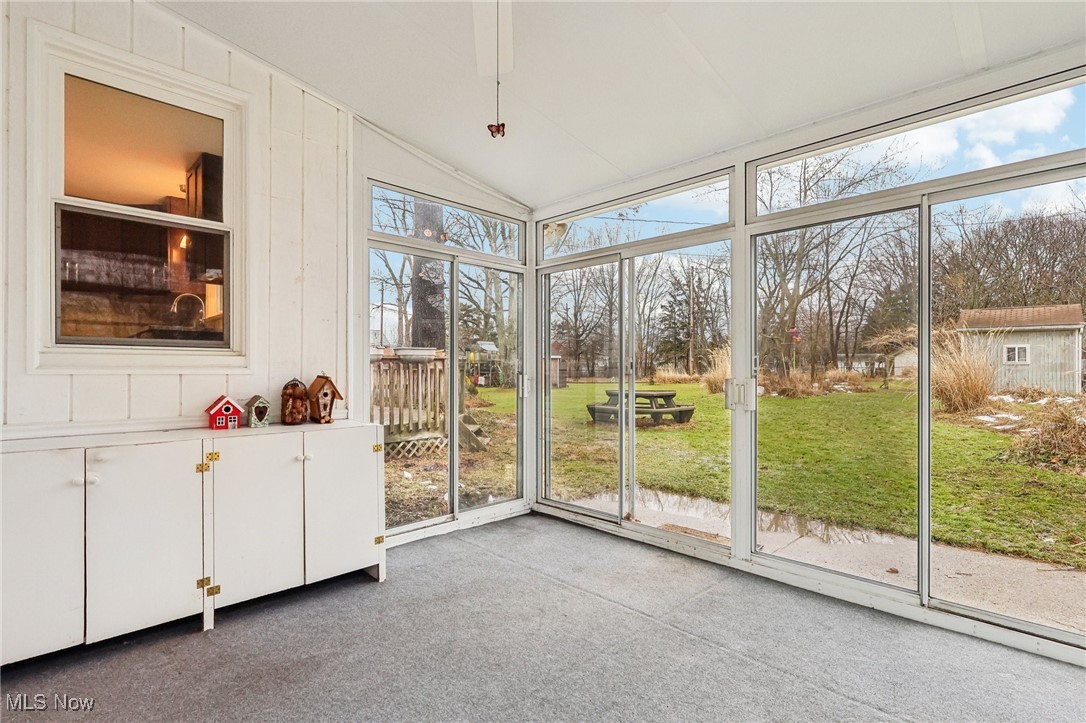 1311 Clearview Road Cleveland, OH 44124 - Photo 39 of 45 Unfurnished sunroom with lofted ceiling