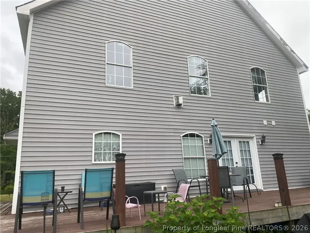 a view of a house with a small chairs