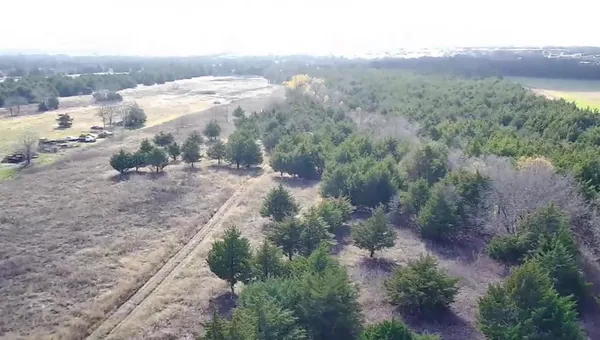 a view of a yard with mountains