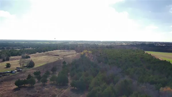an aerial view of residential house and outdoor space