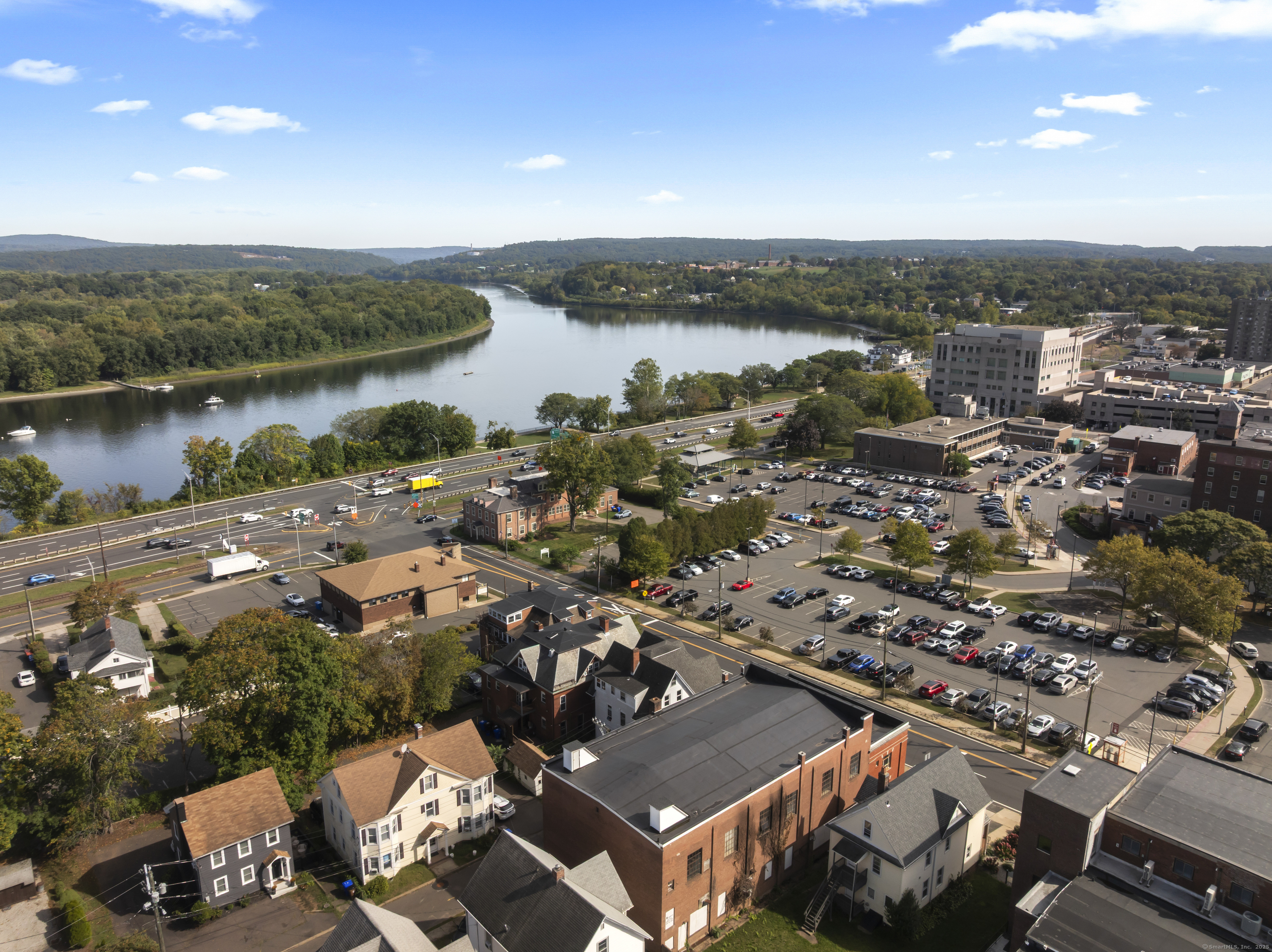 54 Washington Street Middletown, CT 06457 - Photo 4 of 22 an aerial view of a city with houses