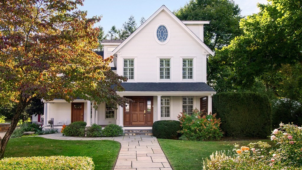 41-43 Stone Street Walpole, MA 02081 - Photo 1 of 36 a front view of a house with a yard
