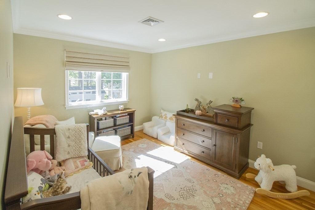 41-43 Stone Street Walpole, MA 02081 - Photo 17 of 36 a living room with furniture and a window