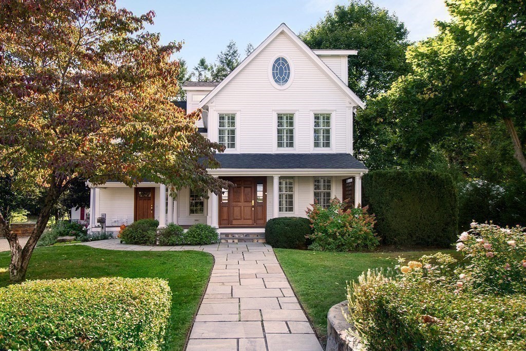 41-43 Stone Street Walpole, MA 02081 - Photo 24 of 36 a front view of a house with a yard
