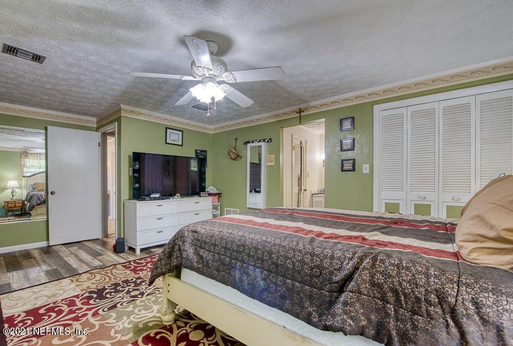 4179 Mustang Road Middleburg, FL 32068 - Photo 22 of 28 21 Master Bedroom