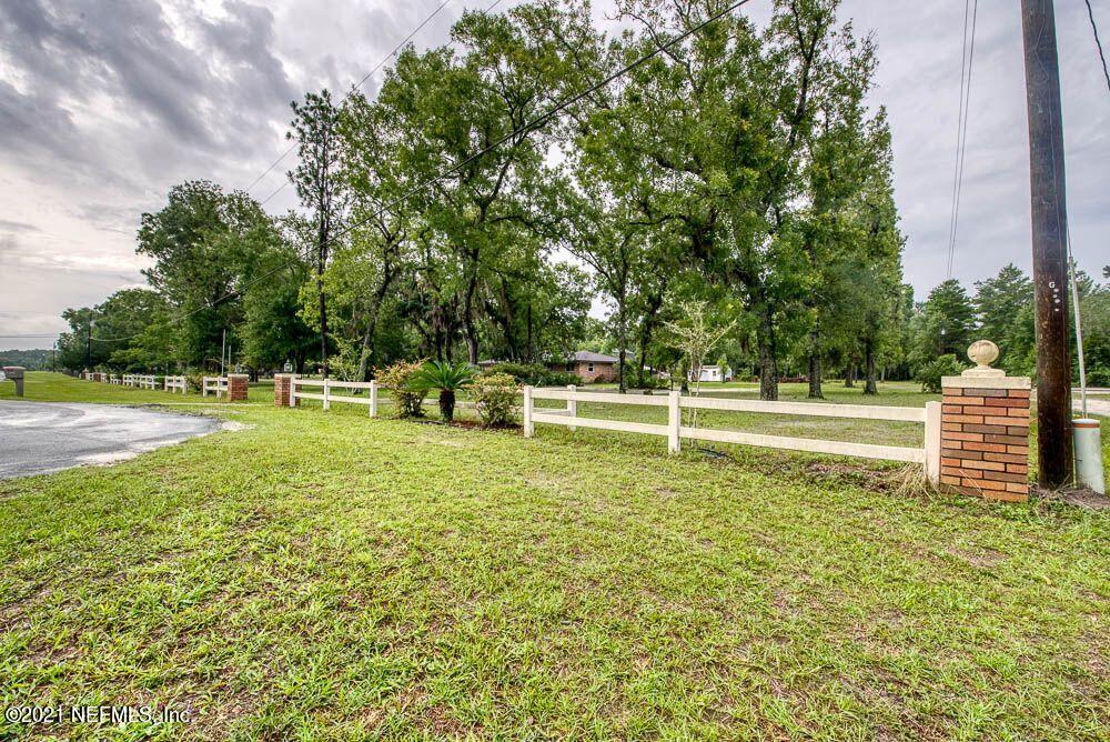 4179 Mustang Road Middleburg, FL 32068 - Photo 27 of 28 27 Right Side Driveway and Gate View