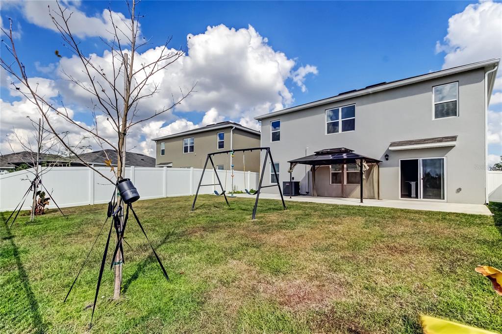 3845 Rory Pond Court Lakeland, FL 33811 - Photo 56 of 68 a house view with a play ground in front of it