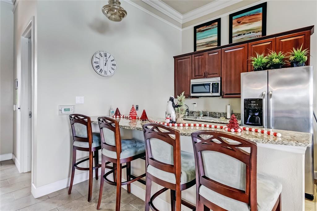 3845 Rory Pond Court Lakeland, FL 33811 - Photo 68 of 68 a dining area with a table and chairs in it