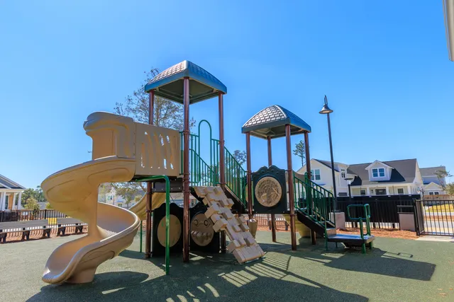 a view of a slide with seating space