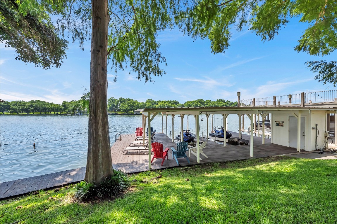 1946 Granite Cove Road Kingsland, TX 78639 - Photo 13 of 31 a childrens park with lots of trees and wooden fence