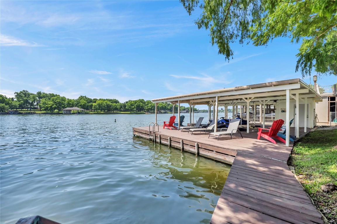 1946 Granite Cove Road Kingsland, TX 78639 - Photo 14 of 31 a view of a swimming pool with lounge chairs in patio