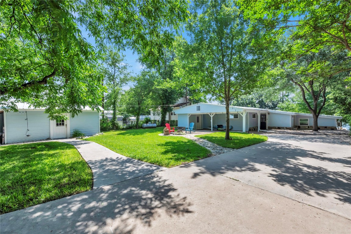 1946 Granite Cove Road Kingsland, TX 78639 - Photo 15 of 31 a front view of a house with a yard