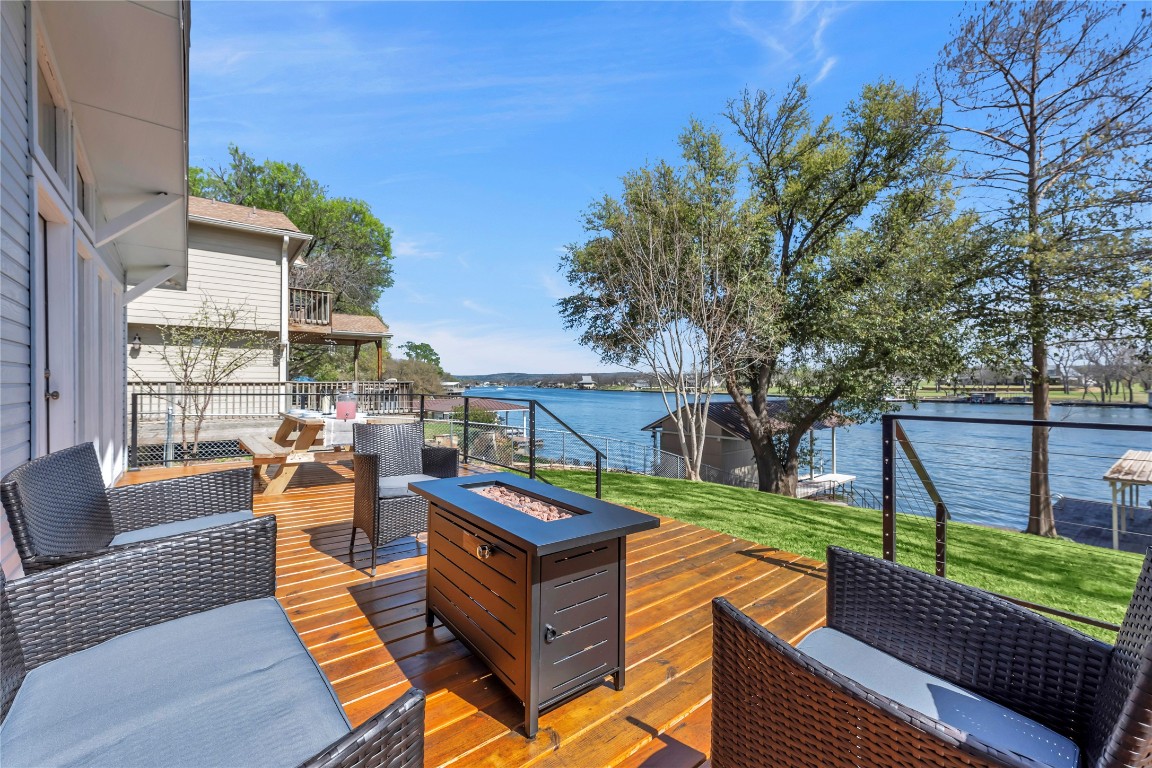 1946 Granite Cove Road Kingsland, TX 78639 - Photo 2 of 31 a view of a patio with couches chairs and a table and chairs