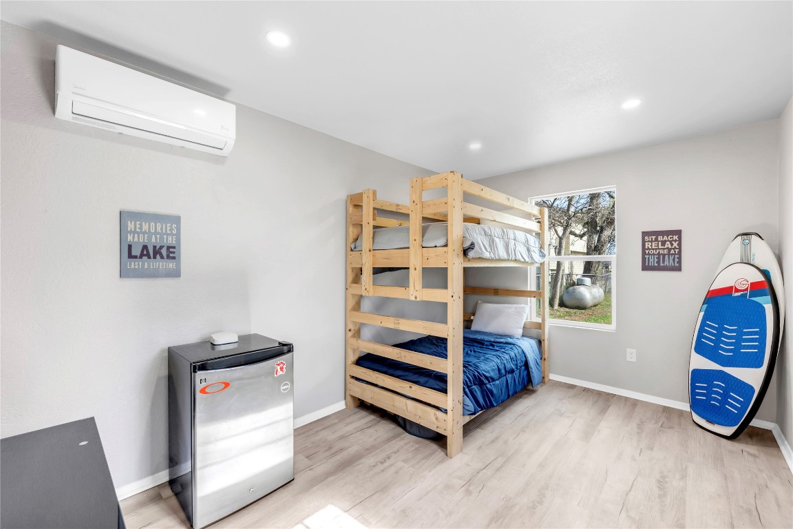 1946 Granite Cove Road Kingsland, TX 78639 - Photo 25 of 31 a room with furniture and white walls
