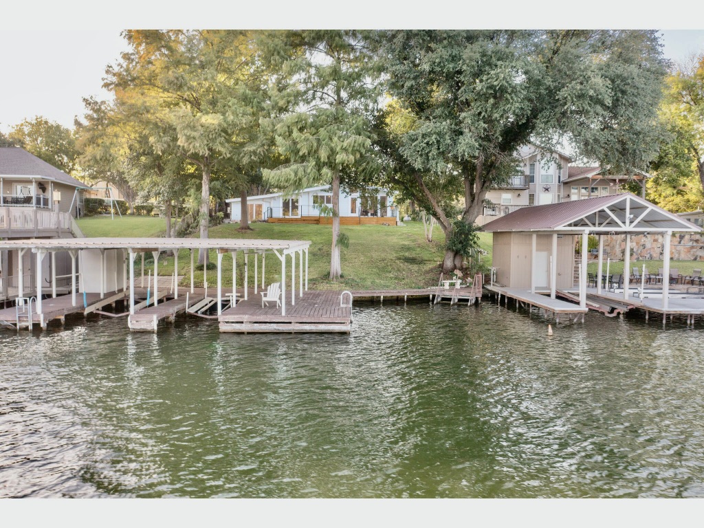 1946 Granite Cove Road Kingsland, TX 78639 - Photo 31 of 31 a view of house with swimming pool and seating space