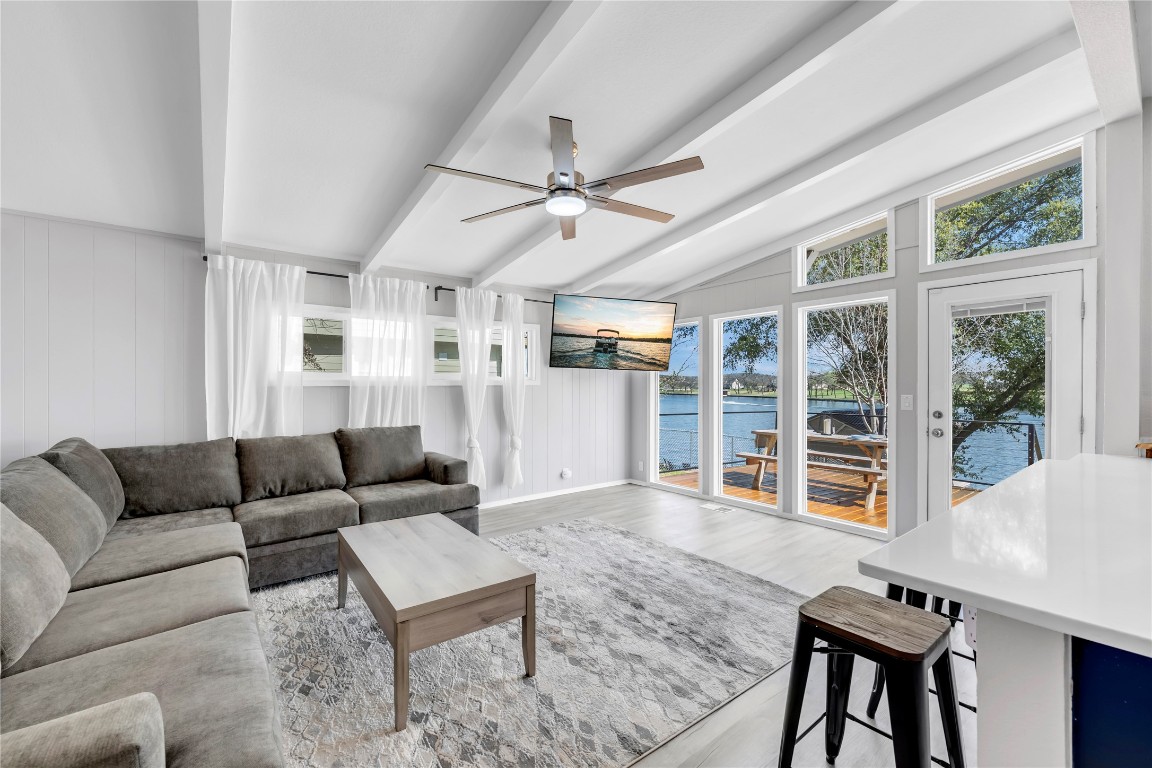 1946 Granite Cove Road Kingsland, TX 78639 - Photo 5 of 31 a living room with furniture ceiling fan and a window
