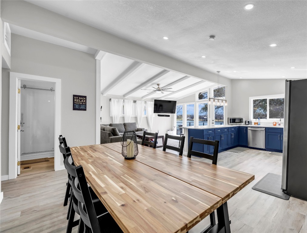 1946 Granite Cove Road Kingsland, TX 78639 - Photo 7 of 31 a living room with furniture kitchen view and a wooden floor