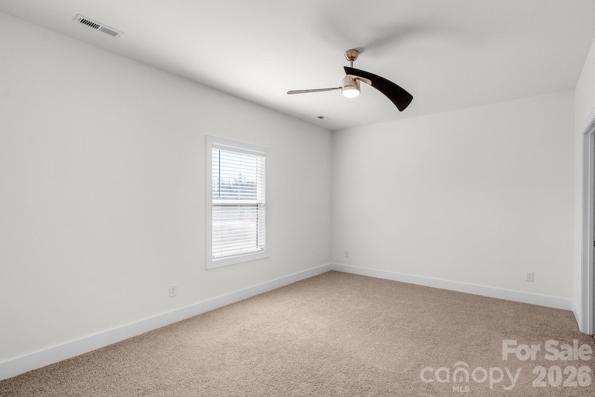 916 Fowler Road Monroe, NC 28110 - Photo 12 of 35 an empty room with a window