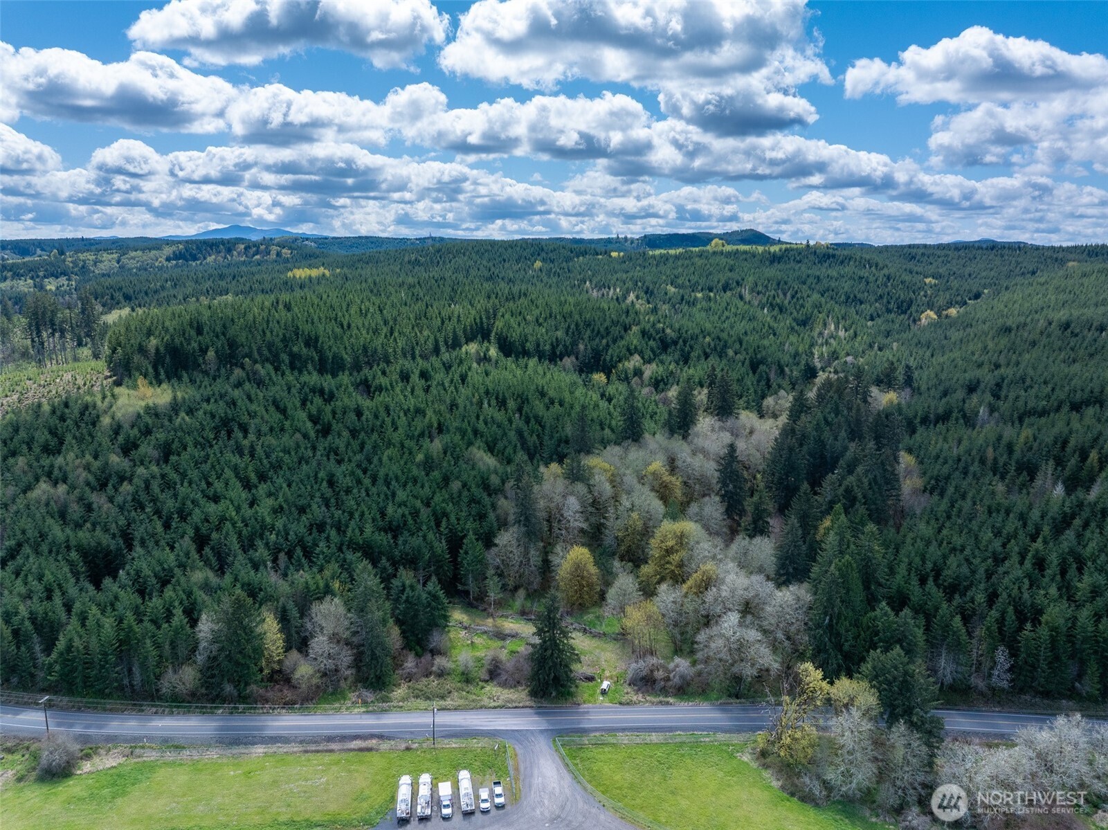 0 Bunker Creek Road Chehalis, WA 98532 - Photo 17 of 20 a view of a lake with houses in the back