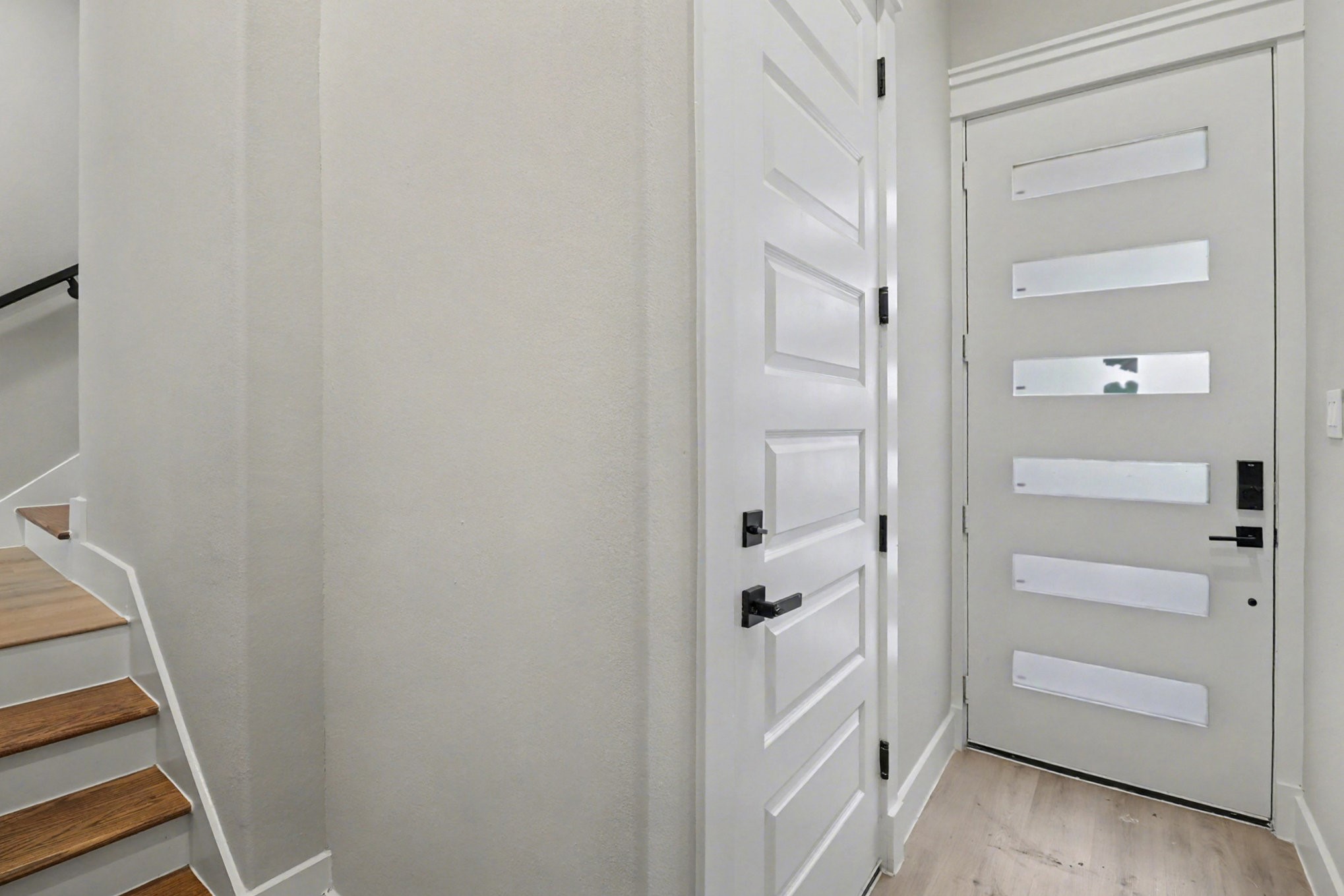 5000 Higgins Street, Unit A Houston, TX 77033 - Photo 30 of 32 a room with white cabinets and a door