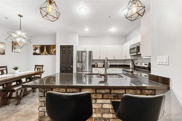 a view of a dining room with furniture