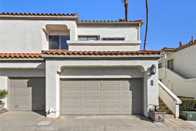 front view of a house with a balcony