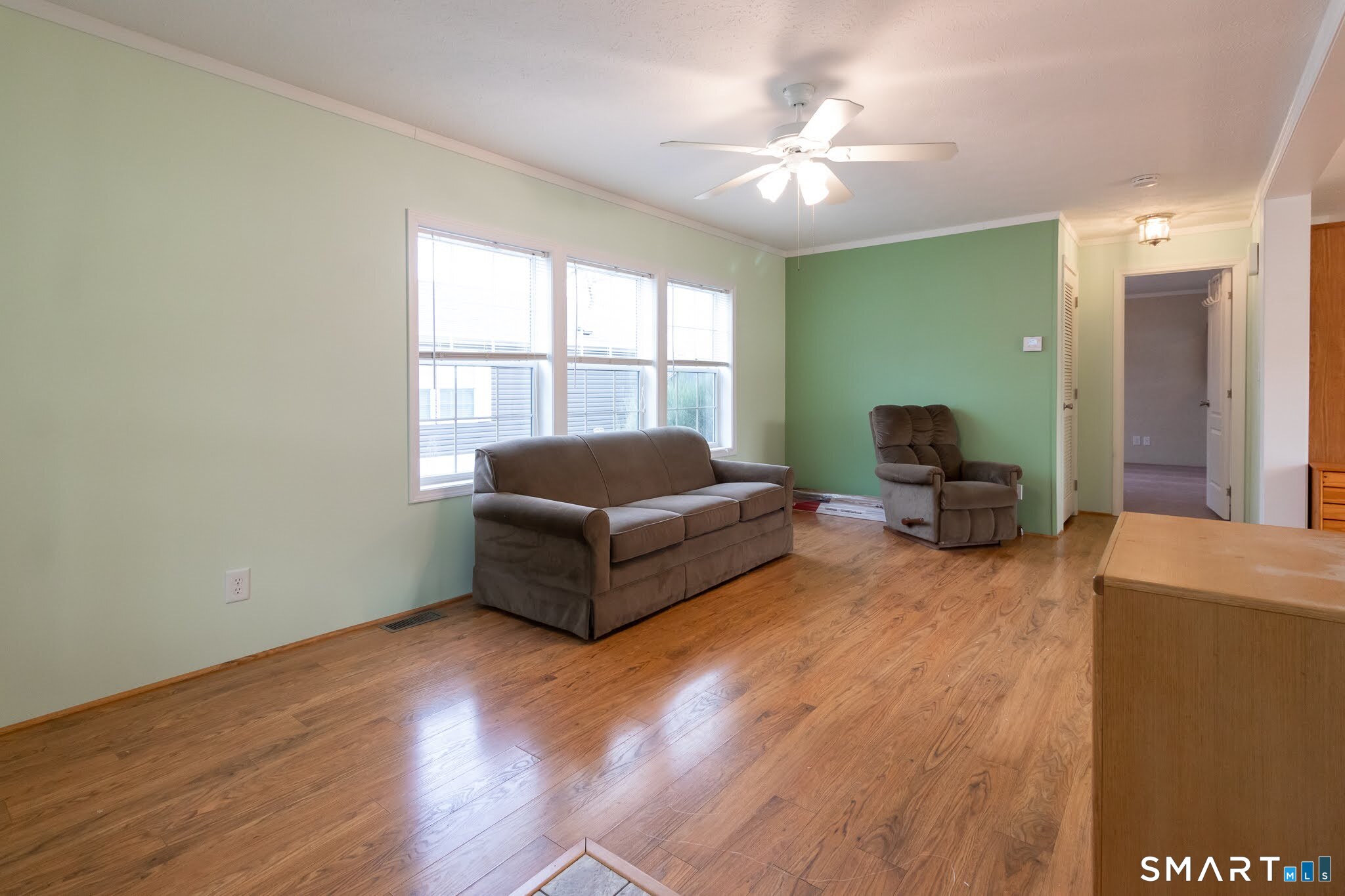 39 Riverside Drive Southington, CT 06489 - Photo 11 of 40 a living room with furniture and a large window