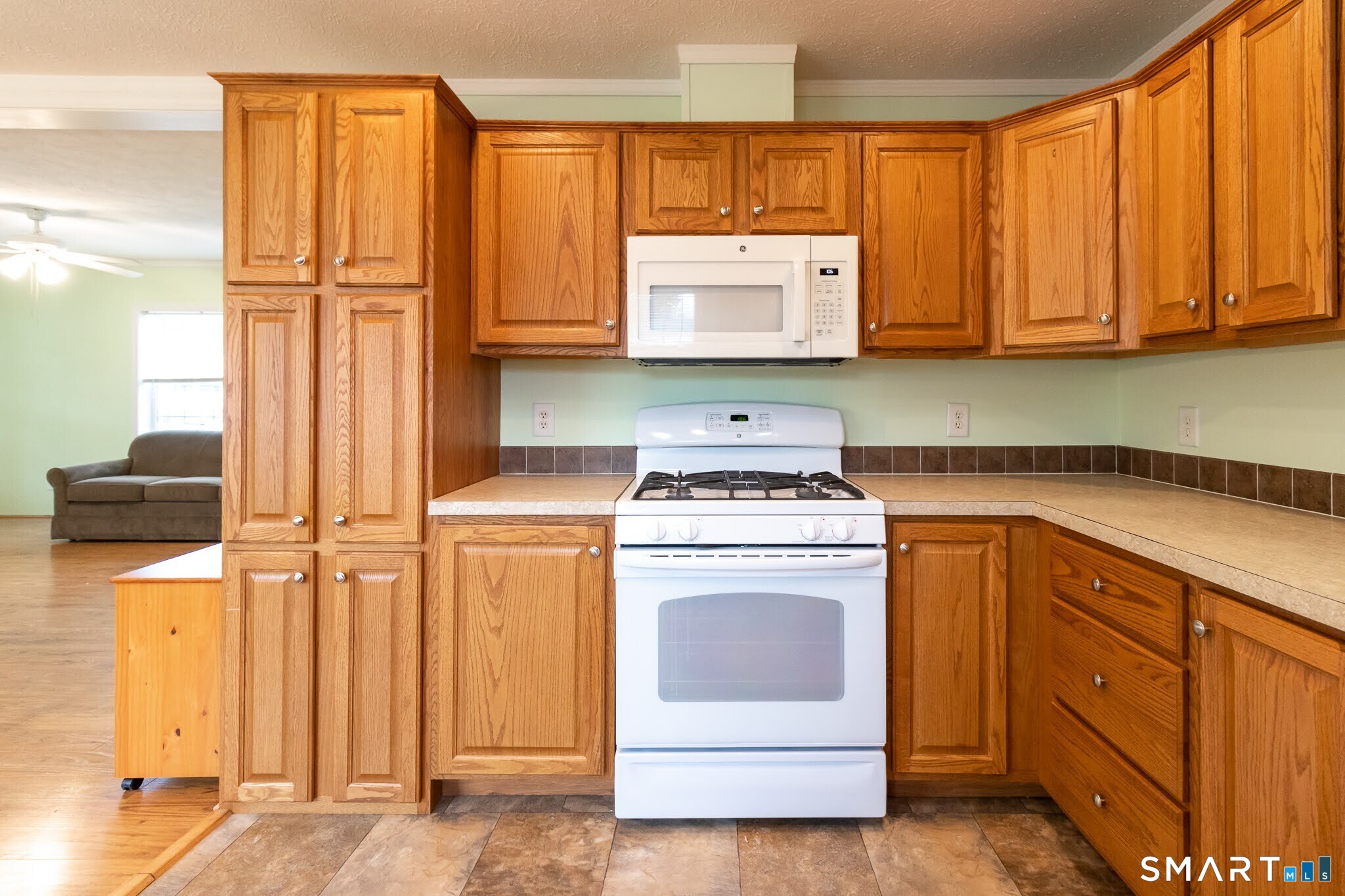 39 Riverside Drive Southington, CT 06489 - Photo 22 of 40 a kitchen with appliances cabinets and a sink