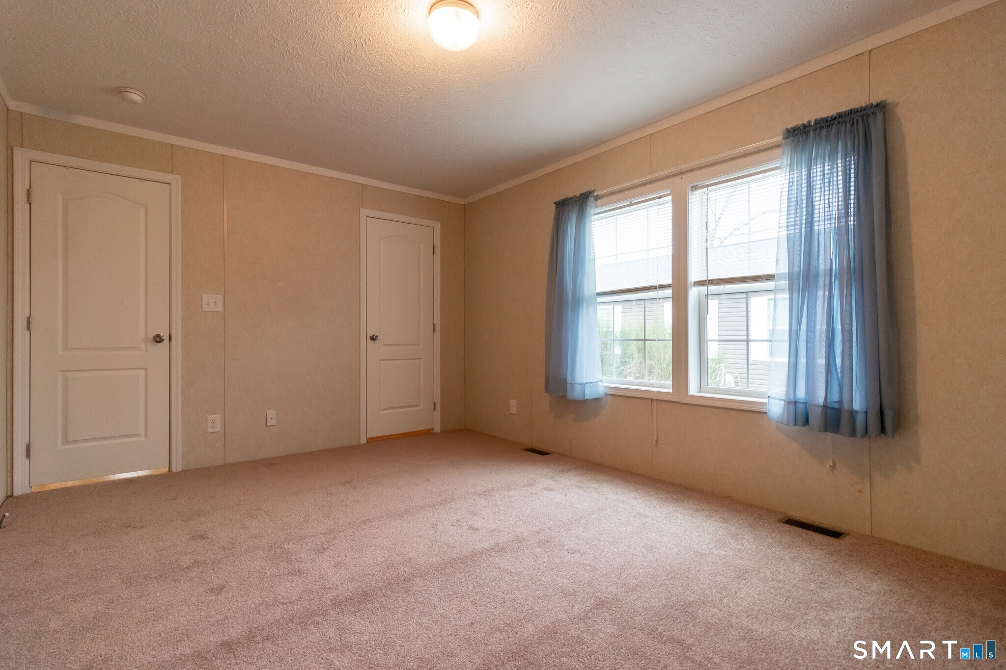 39 Riverside Drive Southington, CT 06489 - Photo 29 of 40 a view of an empty room with a window