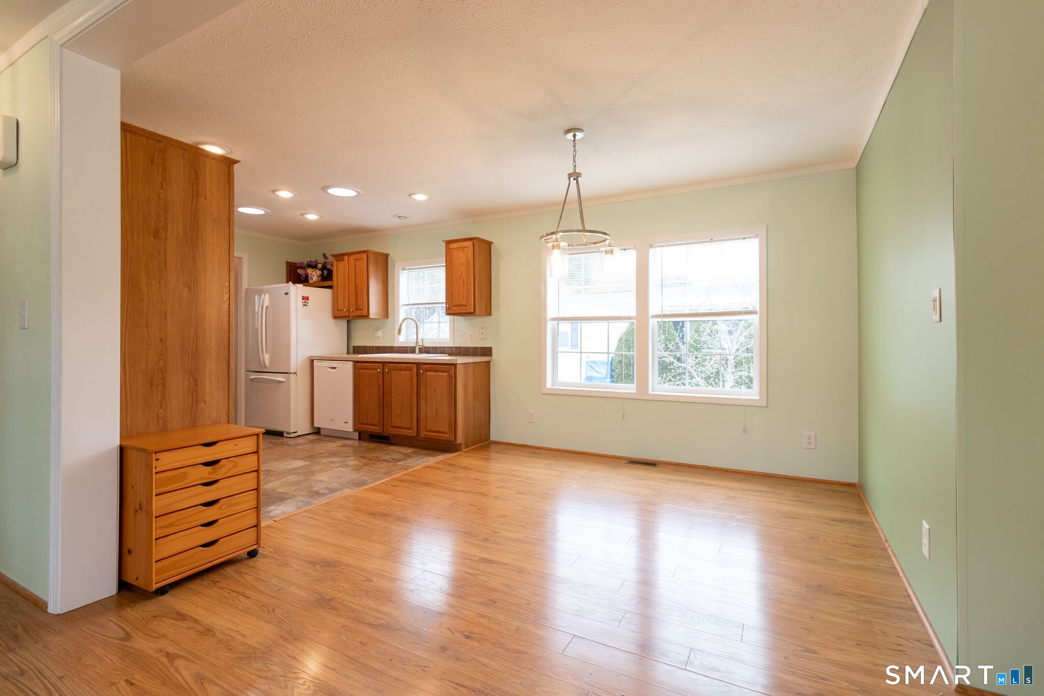 39 Riverside Drive Southington, CT 06489 - Photo 39 of 40 a view of a kitchen with furniture wooden floor and a window