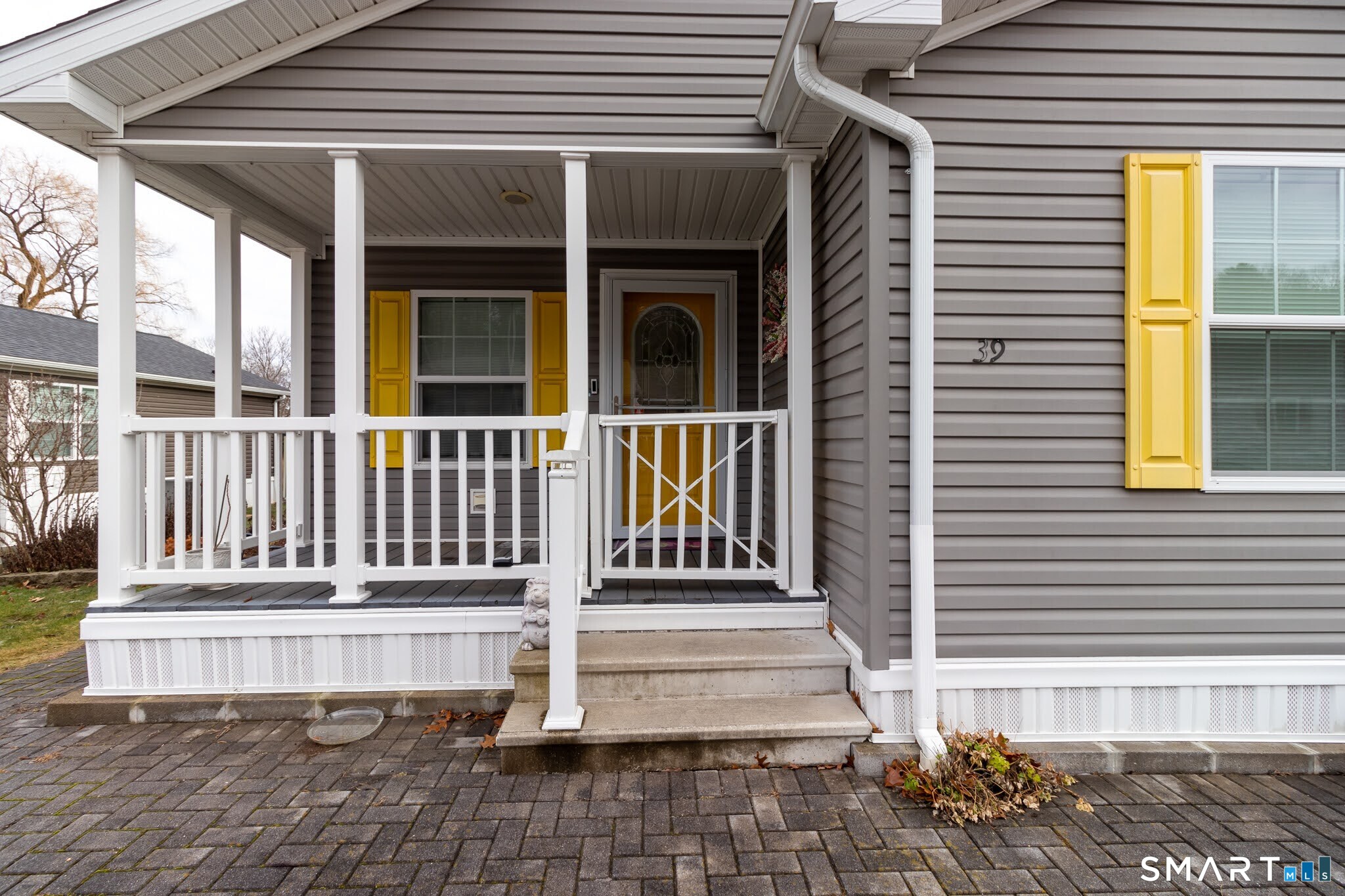 39 Riverside Drive Southington, CT 06489 - Photo 9 of 40 a view of a house with deck and wooden floor