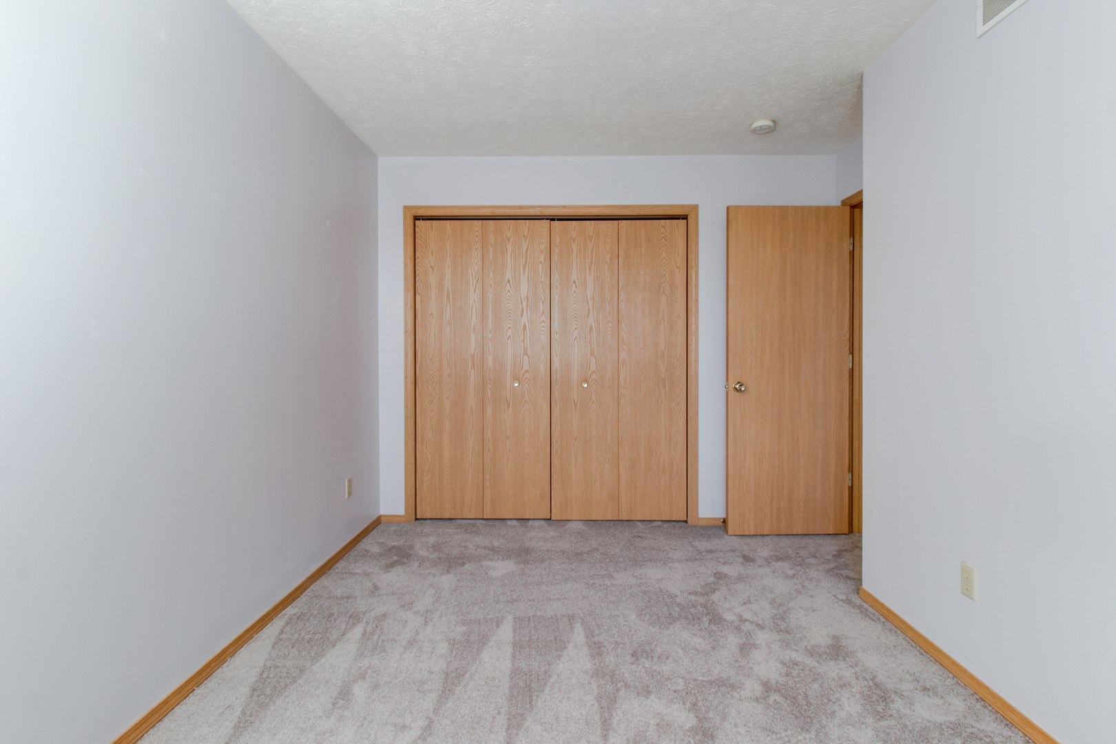 2 Andy Court, Unit 3 Bloomington, IL 61704 - Photo 11 of 13 a view of an empty room with a window