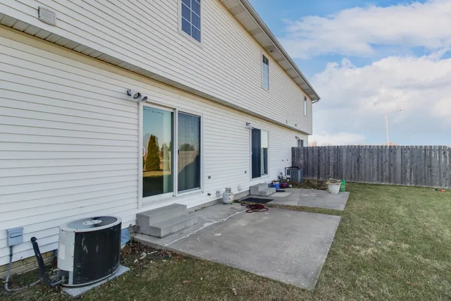 a backyard of a house with seating space